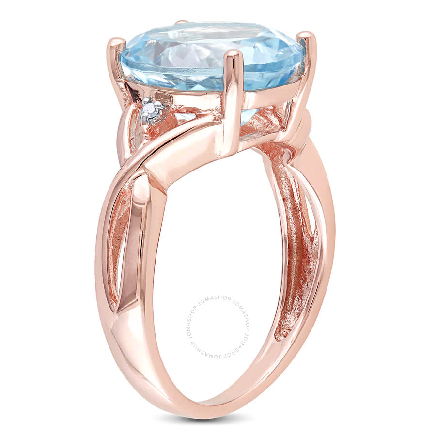 Amour 5 1/2 Ct Tgw Oval Blue Topaz And Diamond Twist Split Shank Cocktail Ring In Rose Plated Sterli In Pink