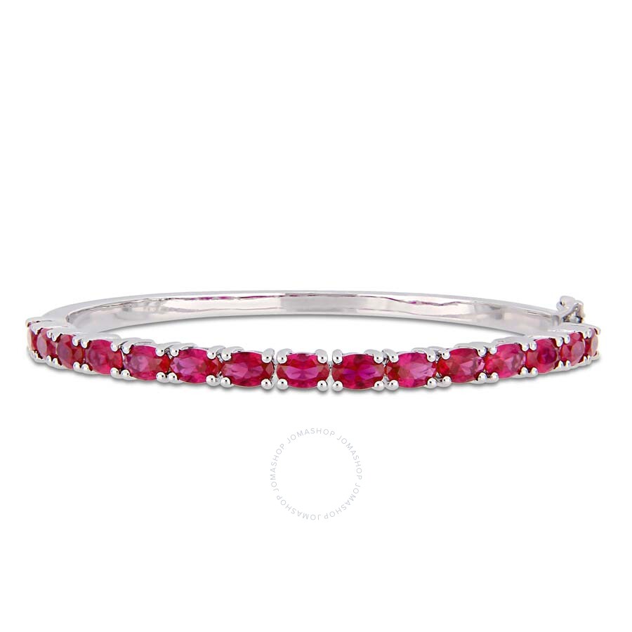 Shop Amour 11-1/4 Ct Tgw Oval-cut Created Ruby Bangle In Sterling Silver In Red