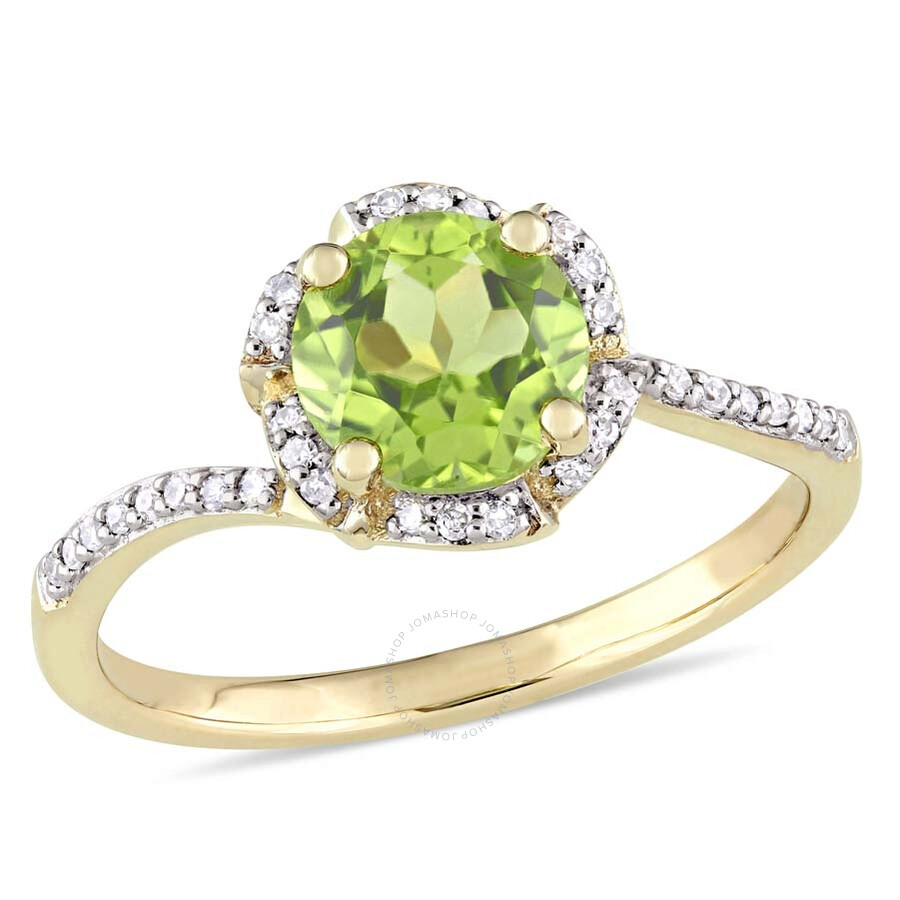 Shop Amour Peridot And 1/10 Ct Tw Diamond Halo Ring In 14k Yellow Gold In Green