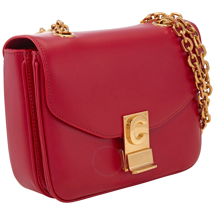 small red shoulder bag