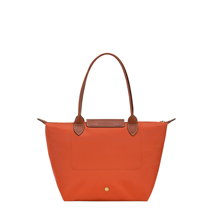 Longchamp Le Pilage Original Red Medium Tote Bag With Two Top Handles And Embossed Logo On The Front In Red